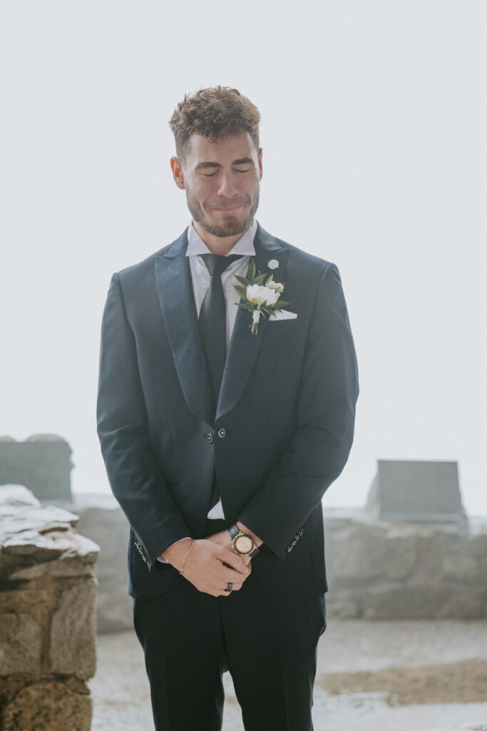 The to-be-wed cries surrounded by fog during their wedding.