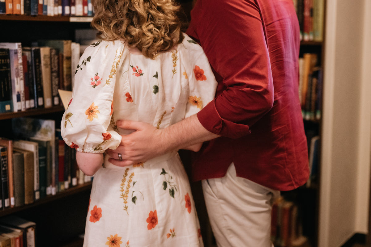 A close up of a person putting their arm around their partner showing elopement picture ideas.