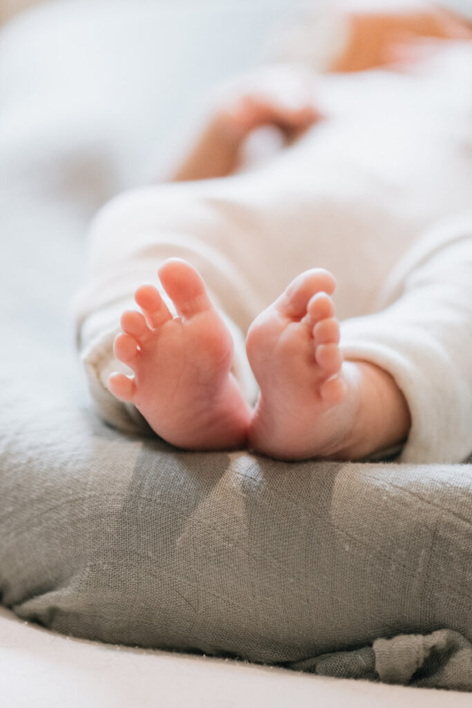 A close up of a newborn's feet. 